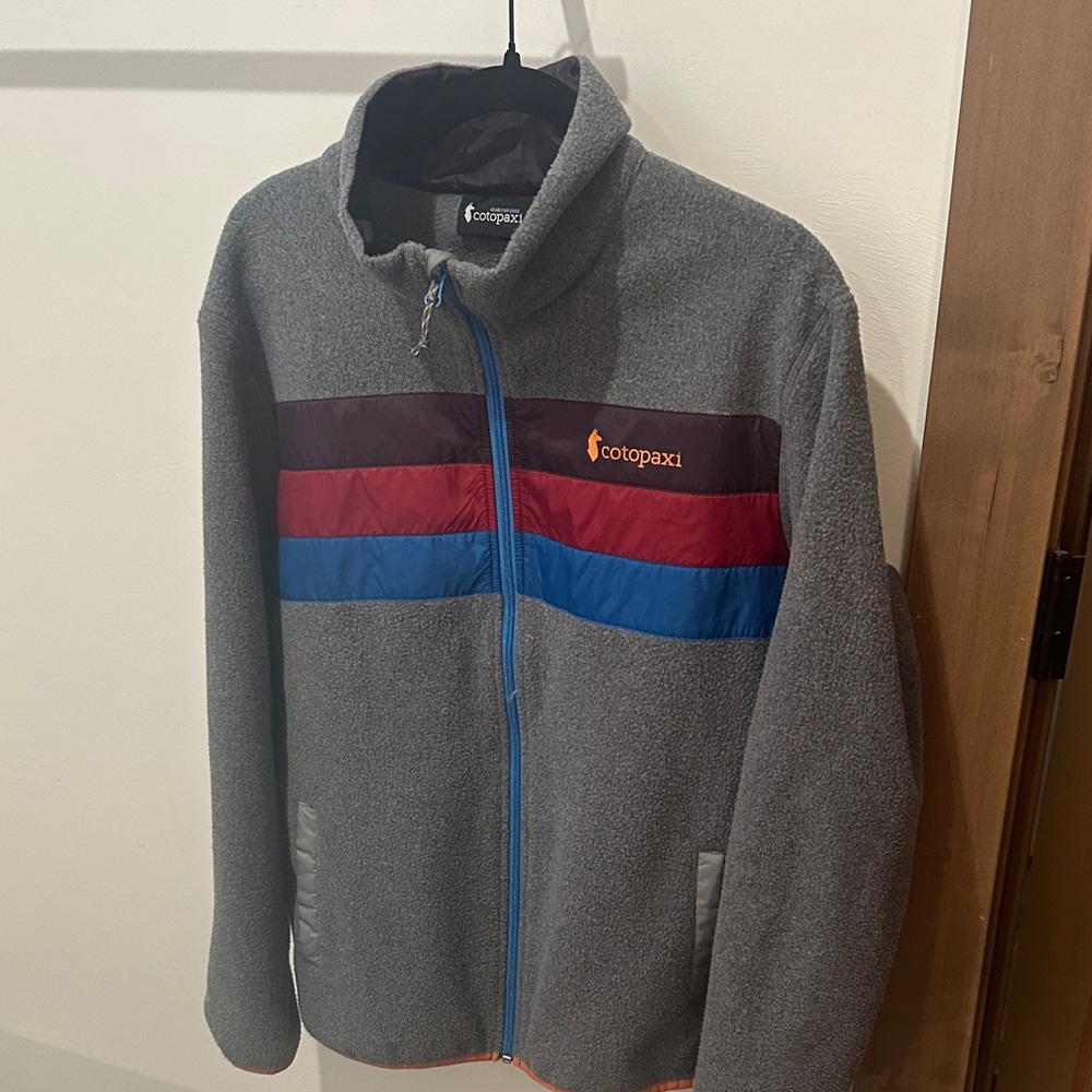 Cotopaxi Men's Gray Jacket with Red and Blue Accents